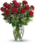 Bouquet of red roses in a clear vase